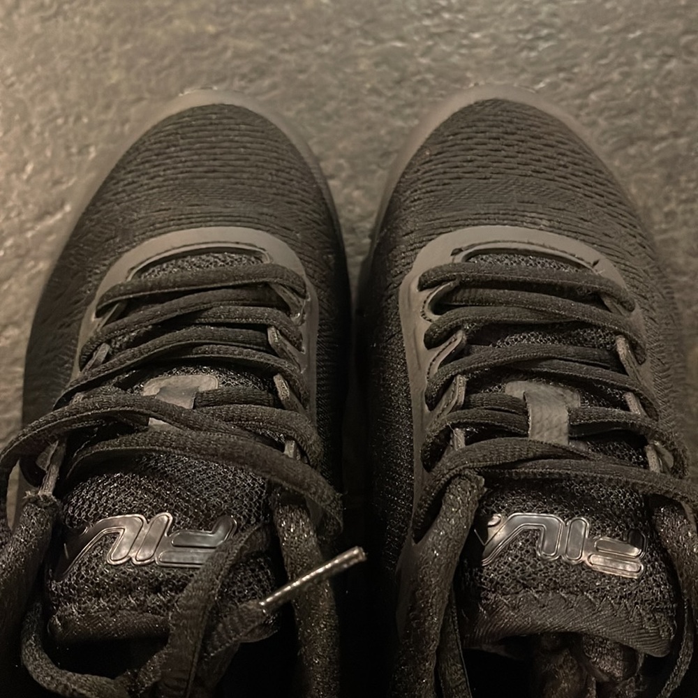 Woman’s Size 7 all black FILA athletic shoes
